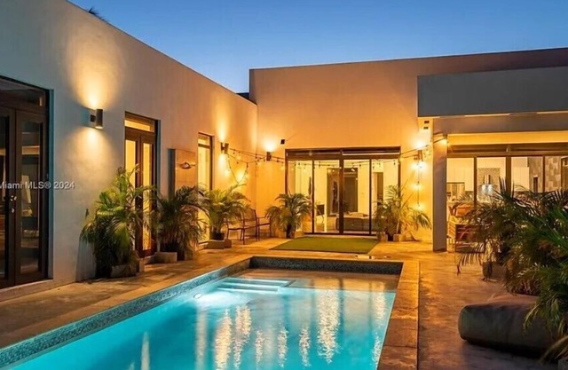Glamorous Waterfront Canal Home w/ Pvt Dock & Pool