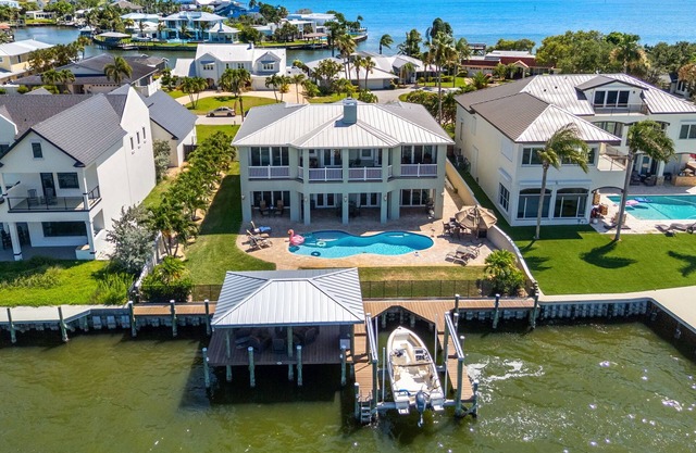 Gorgeous Direct Riverfront Pool Home W/ Private Balcony, Movie Room, & Fire Pit!