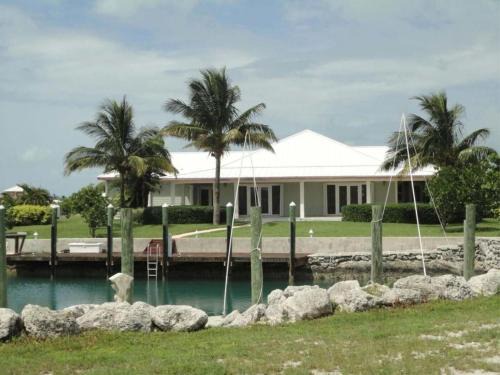 Green House with Dock in West End Bahamas Old Bahama Day