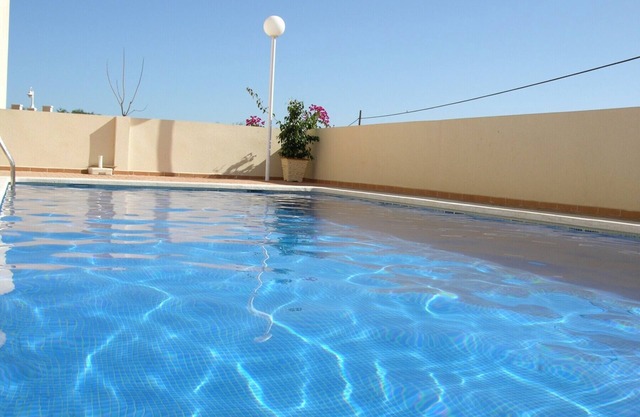 Apart. bajo, wifi gratis, tv satélite, barbacoa, piscina comunitaria