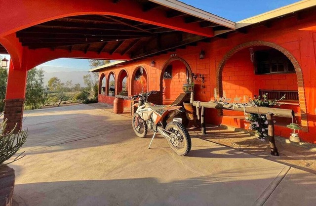 Hacienda with outdoor bar, fireplace and picnic area