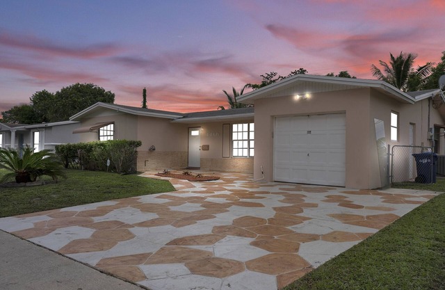 HIDDEN GEM! Spacious 4BR/2B Home W/ Pool and Garage