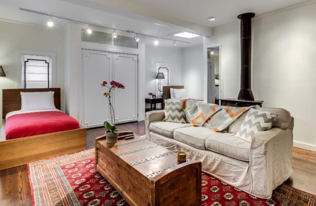 History Surrounds You and This Lovingly Cared for Coach House - Parking Available! by RedAwning