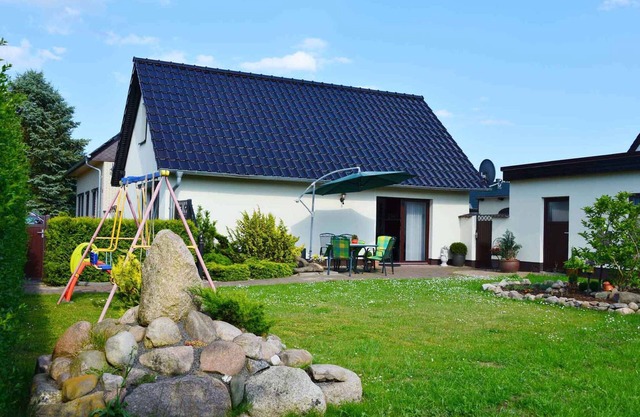 Apartamento vacacional con barcacoa en la terraza