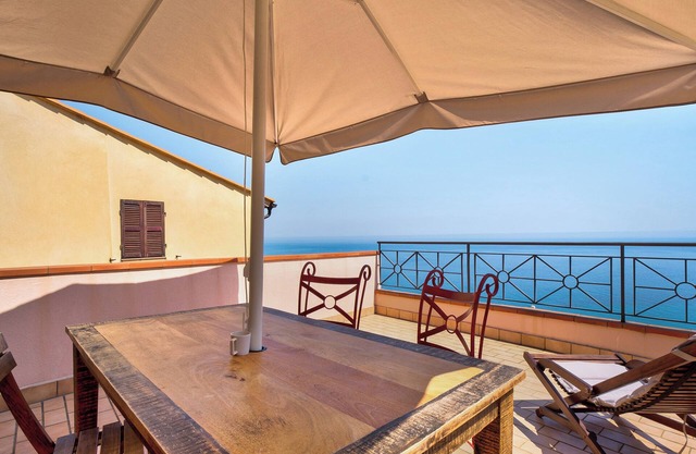 Apartamento vacacional "Casa Scotland" con vistas al mar, terraza privada y Wi-Fi