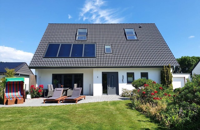 Casa de vacaciones 'Ferienhaus Meerblick' con vistas al mar, terraza privada y Wi-Fi