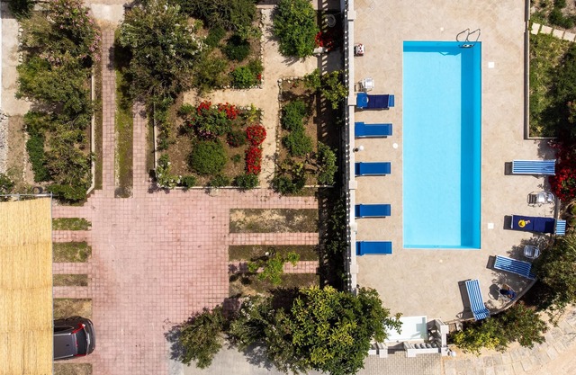 Casa de vacaciones "Casa Papadia - Bilocale Mirto" con piscina, Wi-Fi, aire acondicionado y jardín