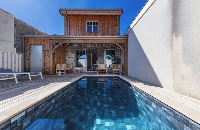 Casa de vacaciones 'Maison De La Plage' con piscina privada, Wi-Fi y aire acondicionado
