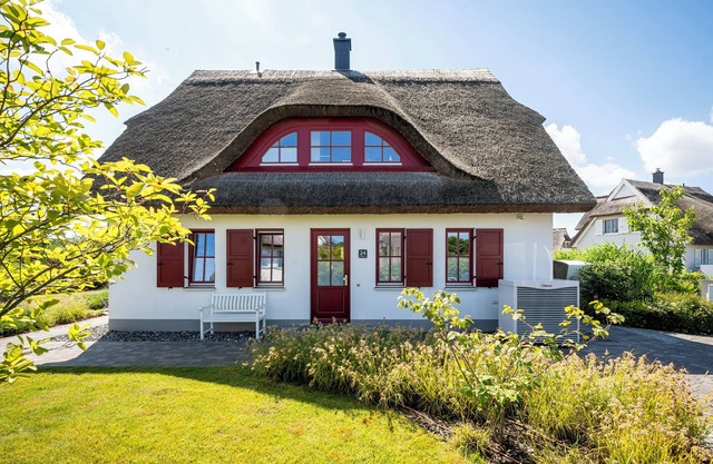 Casa de vacaciones 'Rügenblick 24' con vistas al mar, terraza privada y Wi-Fi