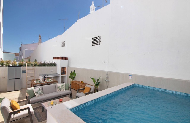 Casa de vacaciones 'El Olivo' con piscina privada, Wi-Fi y aire acondicionado