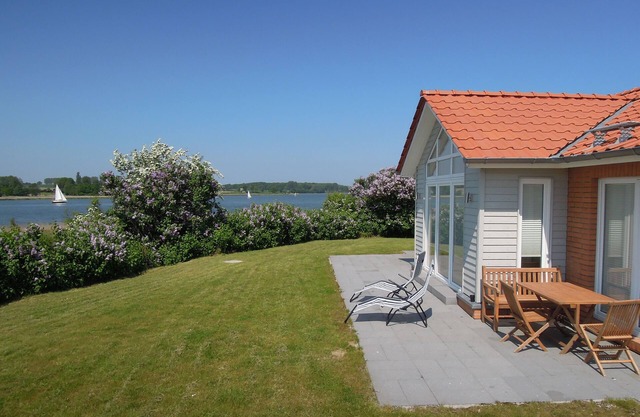 Casa de vacaciones en situación de agua directa | Sauna | Bañera de hidromasaje | Chimenea | Wifi gratis