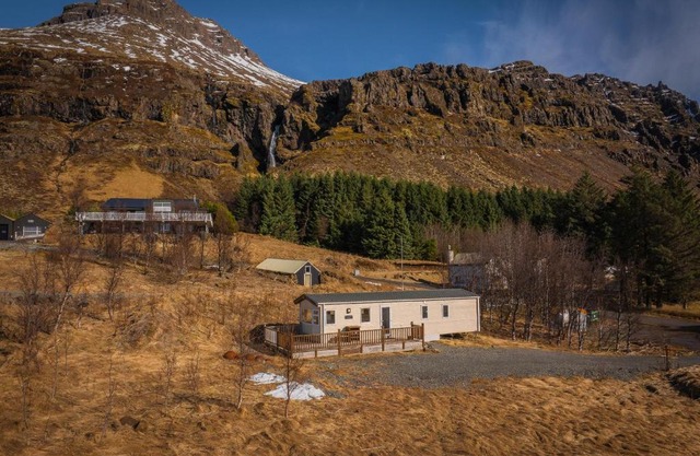 Home under a waterfall 7 mins from Glacier Lagoon