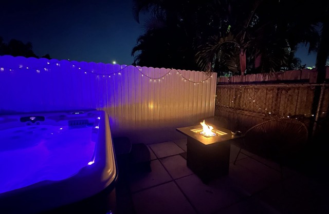 HOT TUB + WASHER AND DRYER in Unit