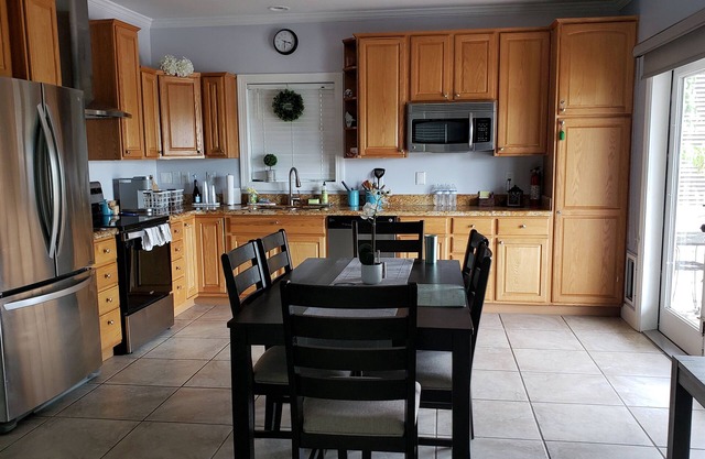 House with 2 balconies, deck with boat ramp, park nearby