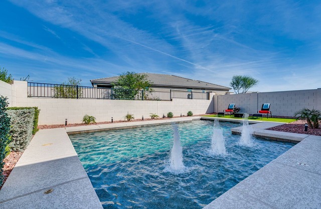 House with outdoor heated pool and recreation area within walking distance