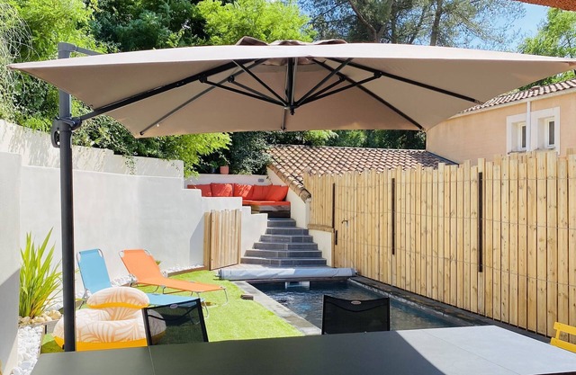 House with pool between river and sea