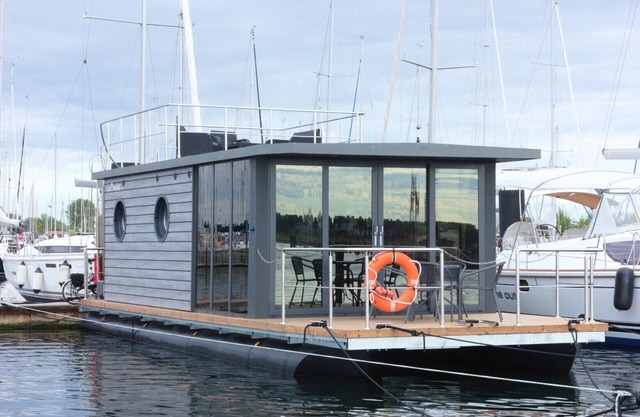 Houseboat Fjord Lacerta with roof terrace in Wendtorf