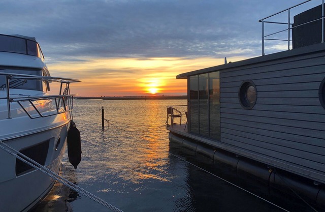 Houseboat Fjord Luna with bio-sauna and roof terrace in Wendtorf