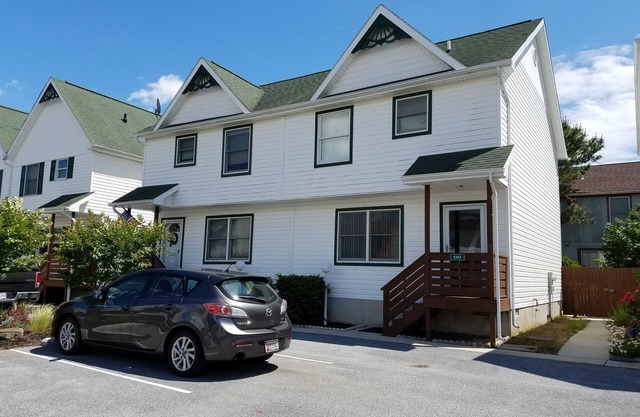 Immaculate townhome with private fenced back patio. 9.98 star rating.