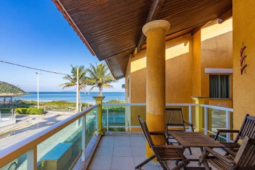Jardim 4Ilhas 203 – Aconchegante Apartamento com Vista para o Mar, a Poucos Metros da Praia de Quatro Ilhas.