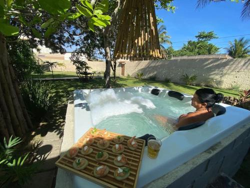 La Famille - Casa com Piscina, Jacuzzi, Jardim e próximo a Praia
