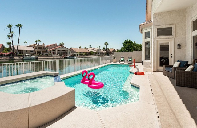 Lakefront Home complete with Mountain Views, Pool, Putting Green & Paddle Boat!