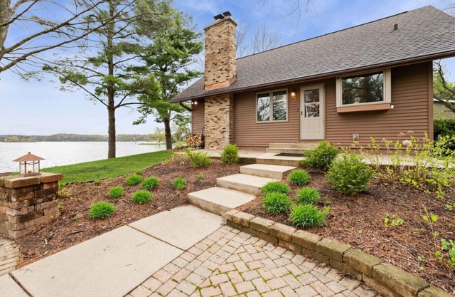 Paddle + Pine – Luxury Lakefront Retreat on Rice Lake | 3BR Waterfront Cabin near Whitewater, WI