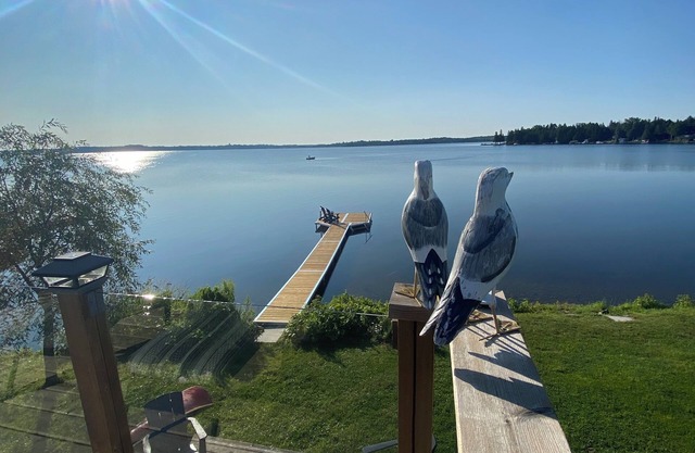 Lakefront renovated farmhouse with incredible lake views and waterfront bunkie