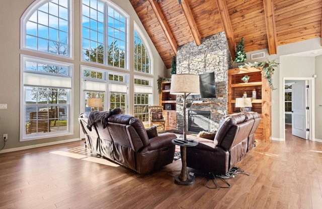 Lakefront retreat with hot tub, water view, game room, home theater & dock