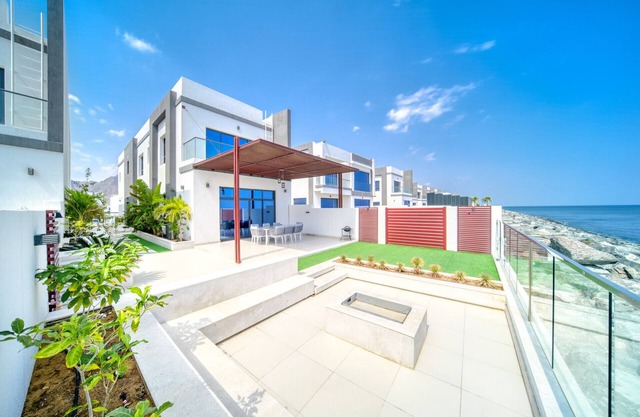 Lavish 4BR Villa w/ 2 Asst Rms, Al Dana Island, Fujairah by Deluxe Holiday Homes