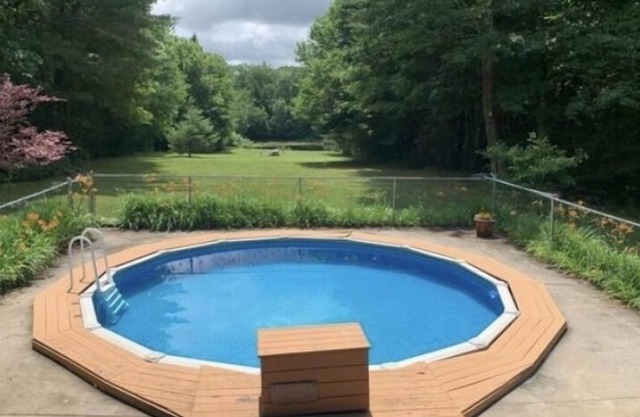log cabin with private stocked pond