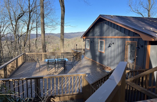 Long range views. Sleeps 10! Hot tub, game tables and close to everything!