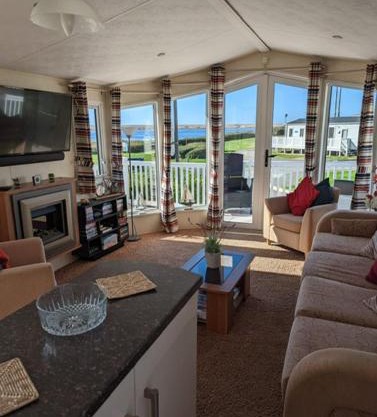 Lovely and Bright Caravan Haven Littlesea with views across the Fleet Lagoon