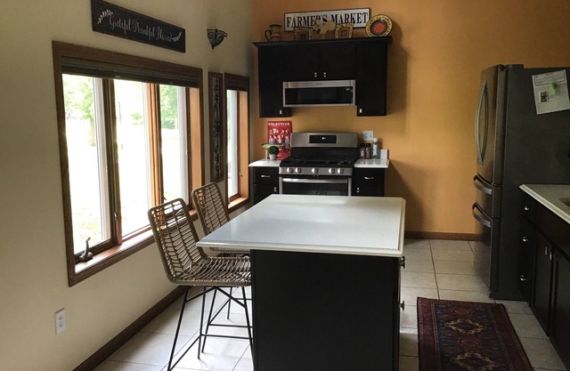 Lovely riverfront destination featuring open concept loft style. Water view.