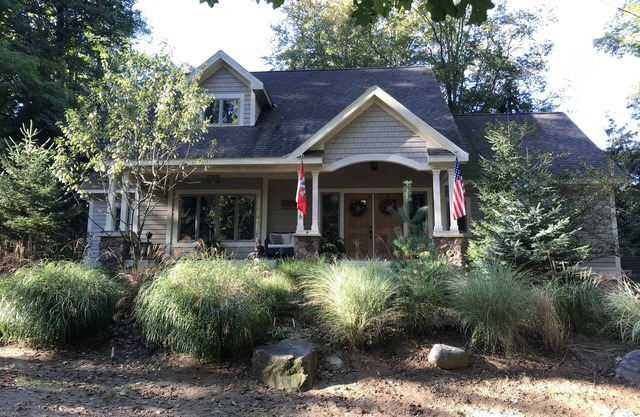 Lujosa casa en el lago Michigan con acceso a playa privada, pozo de fuego, canchas de tenis ...