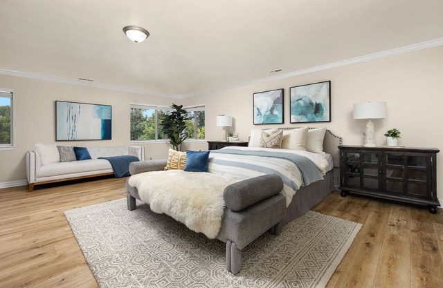 Luxurious large master bedroom with separate refrigerator coffee maker bathtub