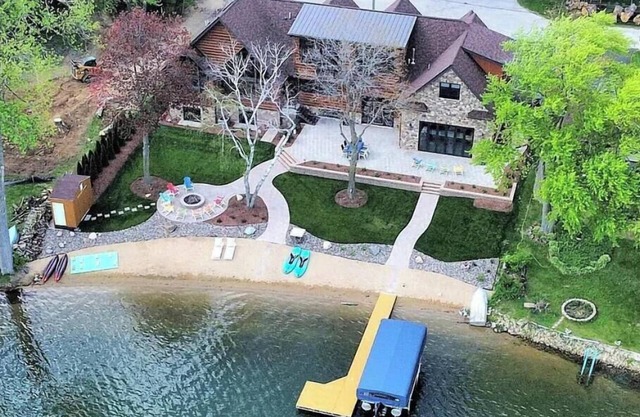 Luxury Lakefront Retreat on Lake Shangrila - 120 ft Beach, Golf Simulator & More