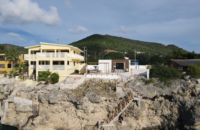 Luxury Oceanfront Retreat with Panoramic Views and Modern Comforts