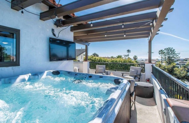 Condominio con vista al mar en el centro de la ciudad con jacuzzi privado