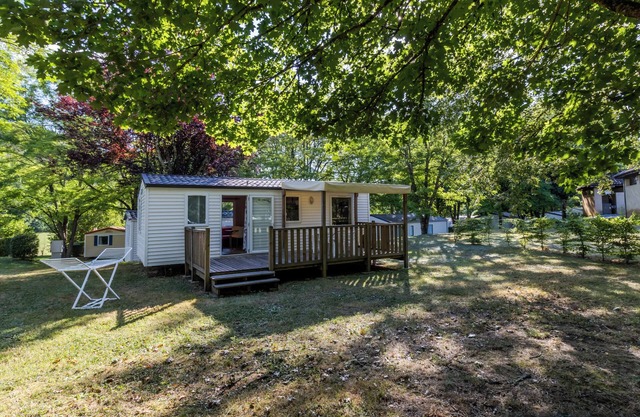 Mobil Home 'Du Bonheur' con piscina compartida, terraza privada y Wi-Fi