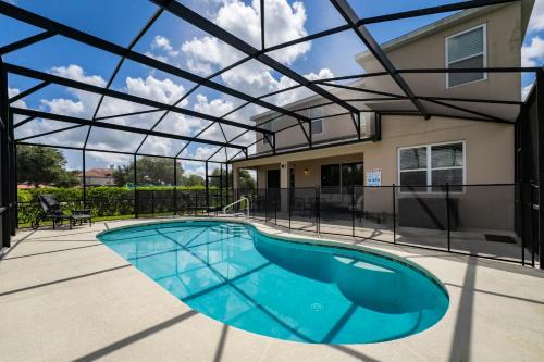 Modern 5BD, 4BA pool home in a golf resort community of Providence