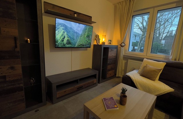 Modern apartment with forest flair and coffee enjoyment