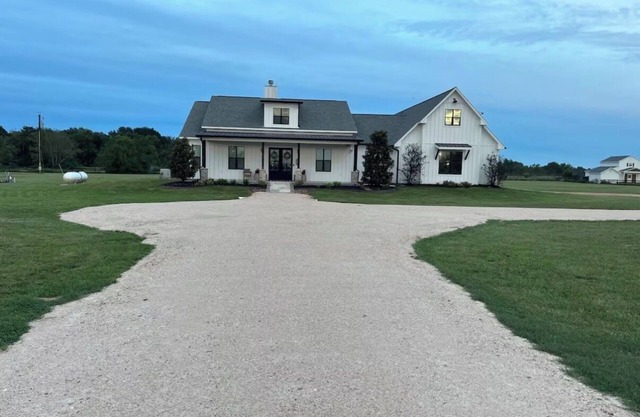 Modern farmhouse with a pool