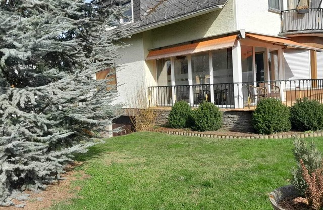 Modern furnished holiday apartment with winter garden and terrace