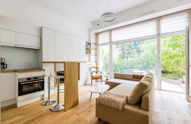 Entresuelo 1BR contemporáneo con minutos de jardín de Notre-Dame, por Veeve