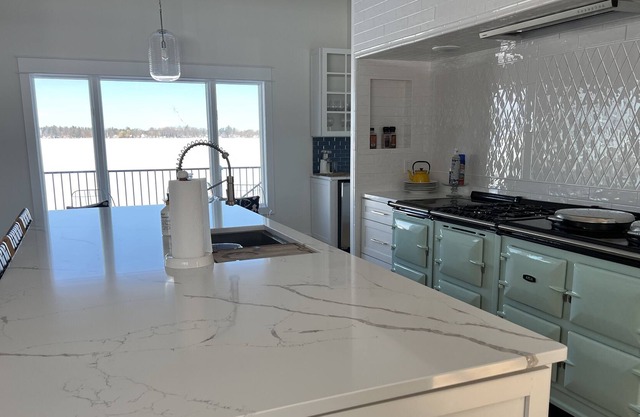 NEW LISTING! Luxury Multi Family Home on Lake Cadillac! Summer or Winter fun!!