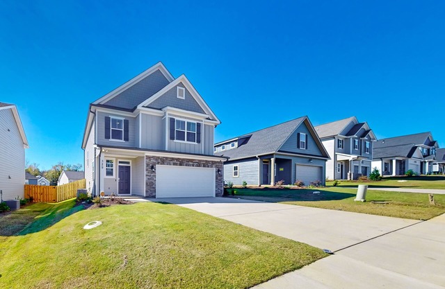 Newly constructed home in a quiet neighborhood with yard, modern interior, & W/D