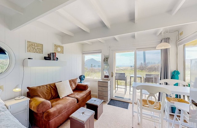 Ocean-view studio near golf with patio, beach gear, kitchenette, & partial AC