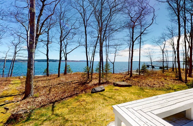 Oceanfront retreat with sunrise views, screened porch, & deck