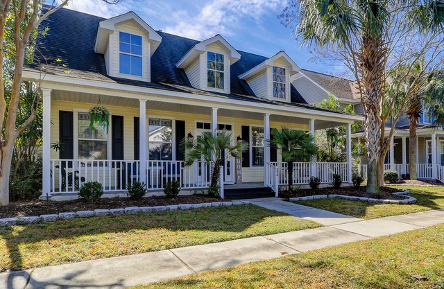 Old Town retreat with golf cart, fenced yard, covered porch, & outdoor living